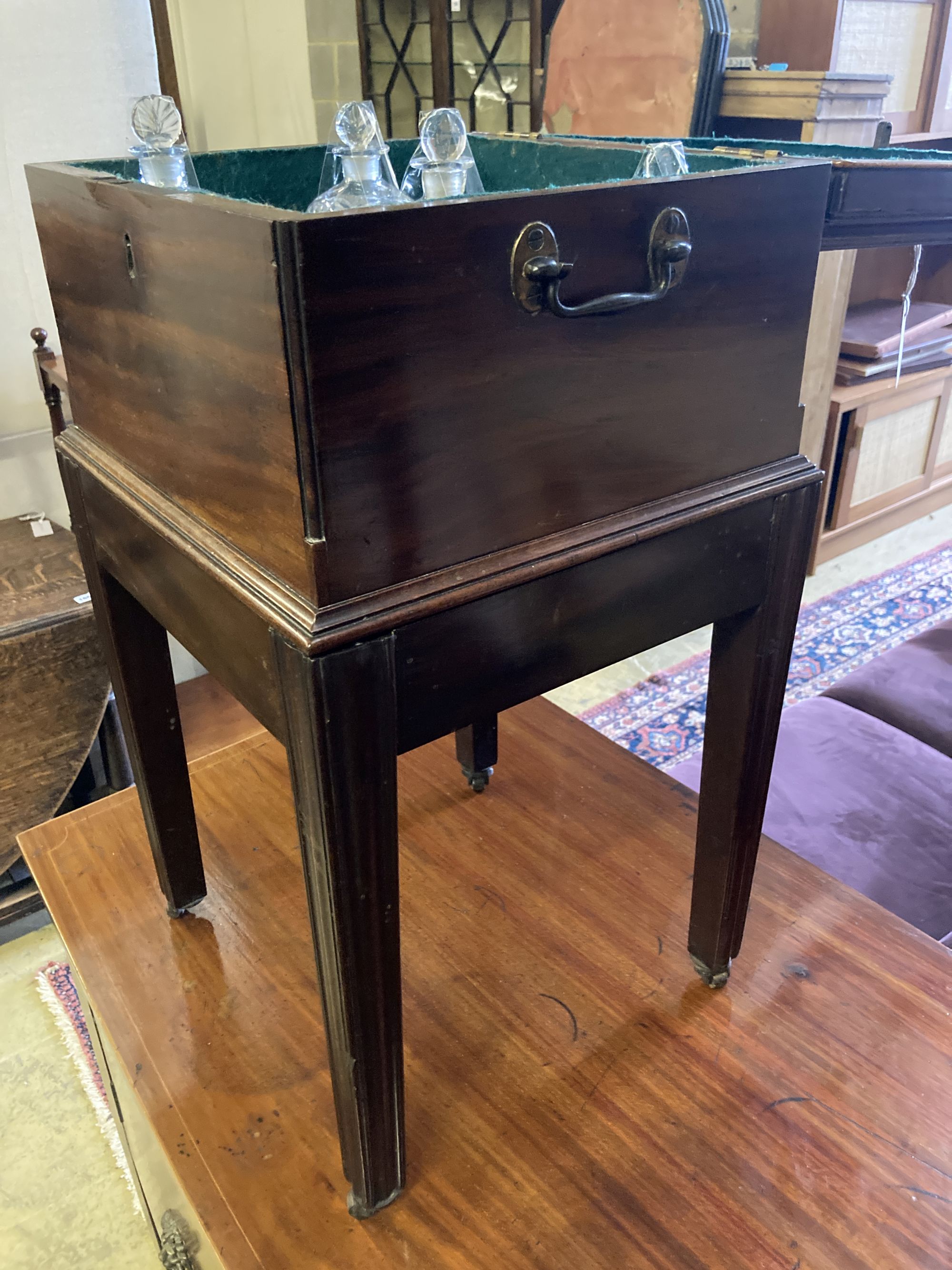 A Chippendale style inlaid mahogany decanter box on stand, width 37cm, depth 36cm, height 67cm